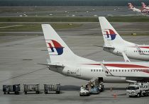 Самолеты компании Malaysia Airlines в аэропорту Куала-Лумпура Самолеты компании Malaysia Airlines в аэропорту Куала-Лумпура