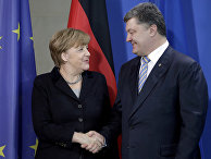 Канцлер Германии Ангела Меркель и президент Украины Петр Порошенко на встрече в Берлине Канцлер Германии Ангела Меркель и президент Украины Петр Порошенко на встрече в Берлине