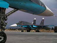 Российские бомбардировщики Су-34 на военной базе Хмеймим в Сирии Российские бомбардировщики Су-34 на военной базе Хмеймим в Сирии