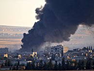 Дым над Кобани после авиаудара сил коалиции во главе с США Дым над Кобани после авиаудара сил коалиции во главе с США
