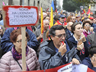 Демонстрация против безработицы в Милане Демонстрация против безработицы в Милане, надпись на плакате: «Нокиа уволила 11 сотрудников»