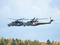 Вертолеты Ми-24 во время демонстрационного показа военной техники в рамках IX Международной выставки вооружения, военной техники и боеприпасов в Нижнем Тагиле Вертолеты Ми-24 во время демонстрационного показа военной техники в рамках IX Международной выставки вооружения, военной техники и боеприпасов в Нижнем Тагиле
