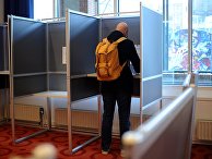 Избиратели во время голосования об ассоциации Украины с ЕС в Амстердаме Избиратели во время голосования об ассоциации Украины с ЕС в Амстердаме