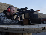 Выстрел из винтовки AR-15 Выстрел из винтовки AR-15