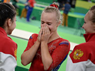 Ангелина Мельникова (Россия) после завершения командного многоборья среди женщин на соревнованиях по спортивной гимнастике на XXXI летних Олимпийских играх Ангелина Мельникова (Россия) после завершения командного многоборья среди женщин на соревнованиях по спортивной гимнастике на XXXI летних Олимпийских играх