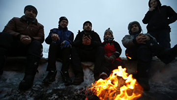 Мигранты во временном лагере для беженцев на острове Сейланд, Норвегия