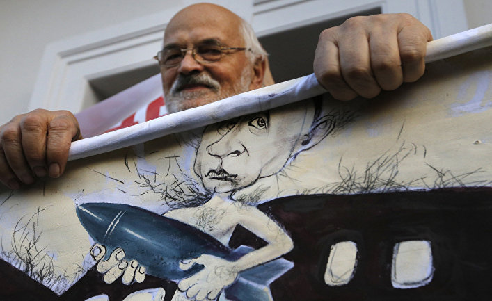 Акция протеста в Минске против российского вмешательства в Сирии