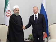 Президент России Владимир Путин (справа) и президент Исламской Республики Иран Хасан Рухани во время встречи в Центре Гейдара Алиева в Баку. Август 2016 года