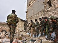 Военные сирийской армии в одном из восточных районов Алеппо Военные сирийской армии в одном из восточных районов Алеппо