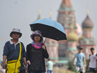Туристы на Красной площади в Москве Туристы на Красной площади в Москве