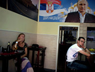 Плакат с изображением Владимира Путина в кафе города Нови-Сад, Сербия Плакат с изображением Владимира Путина в кафе города Нови-Сад, Сербия