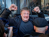 Участник антикоррупционного митинга в Москве Участник антикоррупционного митинга в Москве