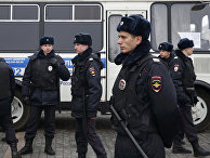 Сотрудники полиции во время несанкционированного антиправительственного митинга в Москве Сотрудники полиции во время несанкционированного антиправительственного митинга в Москве