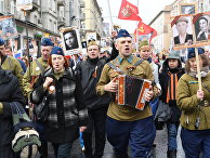 Участники акции "Бессмертный полк" в Москве Участники акции "Бессмертный полк" в Москве