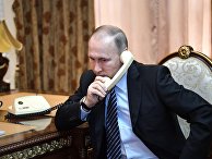 Президент РФ Владимир Путин во время телефонного разговора Президент РФ Владимир Путин во время телефонного разговора