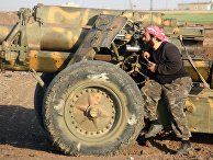 Боевик террористической группировки "Джейш аль-Фатх" в пригороде Алеппо, Сирия Боевик террористической группировки "Джейш аль-Фатх" в пригороде Алеппо, Сирия
