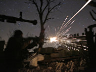 Украинские военнослужащие во время боев с пророссийскими сепаратистами в Авдеевке, Донецкая область Украинские военнослужащие во время боев с пророссийскими сепаратистами в Авдеевке, Донецкая область