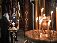 Президент РФ Владимир Путин и глава Русской православной старообрядческой церкви митрополит Корнилий Президент РФ Владимир Путин и глава Русской православной старообрядческой церкви митрополит Корнилий