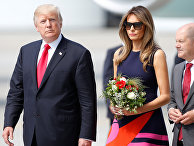 Президент США Дональд Трамп и первая леди Меланья Трамп в аэропорту Гамбурга. 6 июля 2017 Президент США Дональд Трамп и первая леди Меланья Трамп в аэропорту Гамбурга. 6 июля 2017
