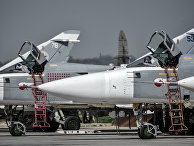 Российские фронтовые бомбардировщики Су-24 на авиабазе "Хмеймим" в сирийской провинции Латакия Российские фронтовые бомбардировщики Су-24 на авиабазе "Хмеймим" в сирийской провинции Латакия