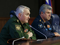 Начальник Главного оперативного управления Генерального штаба Вооруженных сил РФ генерал-полковник Андрей Картаполов во время брифинга по ситуации в Сирии