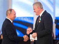 Президент РФ Владимир Путин и награжденный орденом Дружбы бывший президент Республики Сербии Томислав Николич. 4 ноября 2017