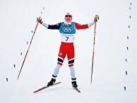 Симен Хегстад Крюгер на финише скиатлона среди мужчин в соревнованиях по лыжным гонкам на XXIII зимних Олимпийских играх в Пхенчхане. 11 февраля 2018 Симен Хегстад Крюгер на финише скиатлона среди мужчин в соревнованиях по лыжным гонкам на XXIII зимних Олимпийских играх в Пхенчхане. 11 февраля 2018