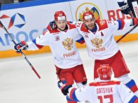 Игроки сборной России Сергей Плотников, Павел Дацюк и Илья Ковальчук радуются заброшенной шайбе в матче между сборными командами России и Финляндии. 18 декабря 2016 Игроки сборной России Сергей Плотников, Павел Дацюк и Илья Ковальчук радуются заброшенной шайбе в матче между сборными командами России и Финляндии. 18 декабря 2016