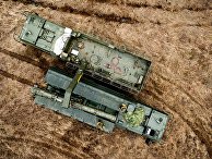 Транспортно-заряжающая машина комплекса "Искандер-К" с крылатыми ракетами Р-500 Транспортно-заряжающая машина комплекса "Искандер-К" с крылатыми ракетами Р-500