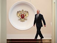Избранный президент РФ Владимир Путин во время церемонии инаугурации в Кремль. 7 мая 2018 Избранный президент РФ Владимир Путин во время церемонии инаугурации в Кремль. 7 мая 2018