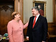 Канцлер Германии Ангела Меркель и президент Украины Петр Порошенко во время встречи в городе Аахен в Германии. 10 мая 2018 Канцлер Германии Ангела Меркель и президент Украины Петр Порошенко во время встречи в городе Аахен в Германии. 10 мая 2018
