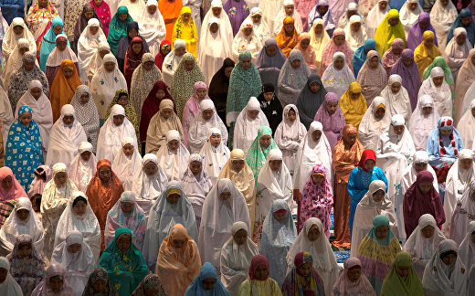 Muslim women attend prayers at the first day of the holy fasting month of Ramadan Muslim women attend prayers at the first day of the holy fasting month of Ramadan