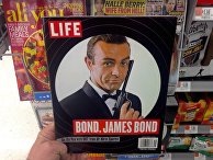 Шон Коннери в роли Джеймса Бонда на обложке Life Шон Коннери в роли Джеймса Бонда на обложке Life