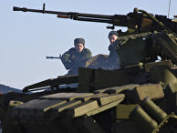 Блокпост пророссийских ополченцев к северу от Луганска Блокпост пророссийских ополченцев к северу от Луганска