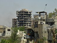 Разрушенные здания в квартале Кабун в пригороде Дамаска