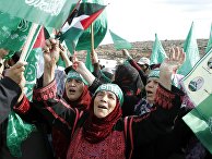 Палестинцы на египетско-израильской границе в ожидании обмена пленных Палестинцы на египетско-израильской границе в ожидании обмена пленных