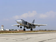 Российский Су-24М взлетает с авиабазы «Хмеймим» в Сирии Российский Су-24М взлетает с авиабазы «Хмеймим» в Сирии