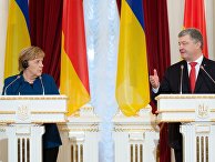 Президент Украины Петр Порошенко и канцлер Германии Ангела Меркель во время встречи. 1 ноября 2018