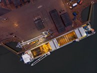 Погрузка труб для в Котке, Финляндия Погрузка труб для в Котке, Финляндия