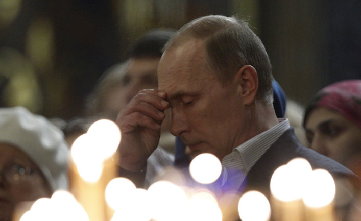Владимир Путин на рождественской службе в Сочи Владимир Путин на рождественской службе в Сочи
