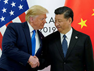 Президент США Дональд Трамп пожимает руку председателю Китая Си Цзиньпину во время саммита лидеров G20 в Осаке Президент США Дональд Трамп пожимает руку председателю Китая Си Цзиньпину во время саммита лидеров G20 в Осаке