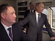 Путин проехал на поезде по Керченскому мосту Путин проехал на поезде по Керченскому мосту