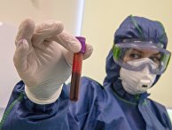 Сотрудник в лаборатории международного медицинского кластера Сотрудник в лаборатории международного медицинского кластера