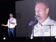 Алексей Навальный во время выступления на оппозиционном митинге в Москве Алексей Навальный во время выступления на оппозиционном митинге в Москве