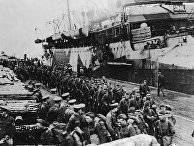 Солдаты армии США после высадки в Архангельске в сентябре 1918 года Солдаты армии США после высадки в Архангельске в сентябре 1918 года