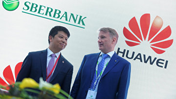 Исполнительный директор Huawei Technologies Co.,Ltd. Го Пин (слева) и президент, председатель правления ОАО 