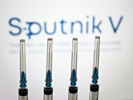 Шприцы на фоне логотипа "Спутник V" Шприцы на фоне логотипа "Спутник V"