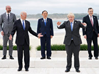Лидеры стран G7 позируют для фотографии во время саммита Лидеры стран G7 позируют для фотографии во время саммита